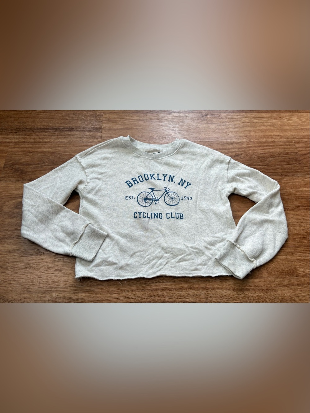 Girls SO Cream Crewneck Sweater with Blue Bicycle Graphic